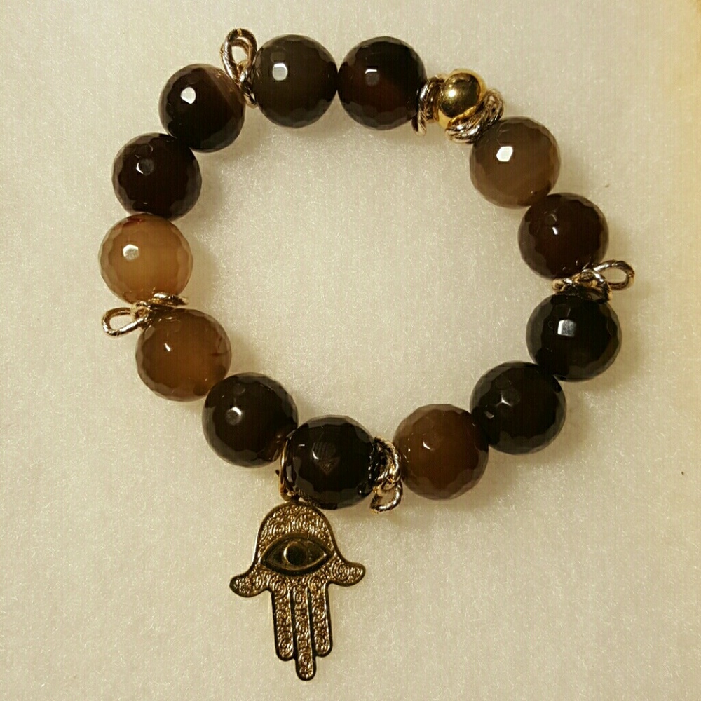 Colorful beads and gold plated figures bracelets.
